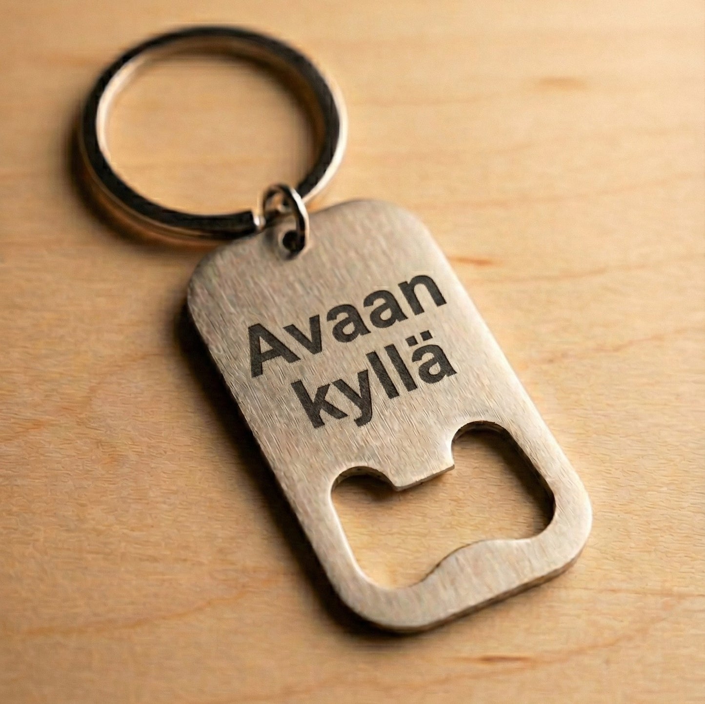 Pullonavaaja-avaimenperä omalla tekstillä