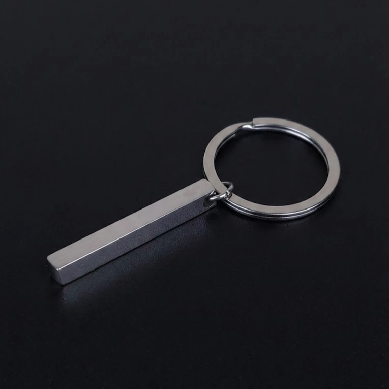 Palkki-avaimenperä omalla tekstillä