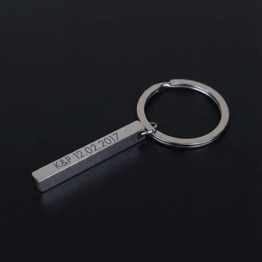 Palkki-avaimenperä omalla tekstillä